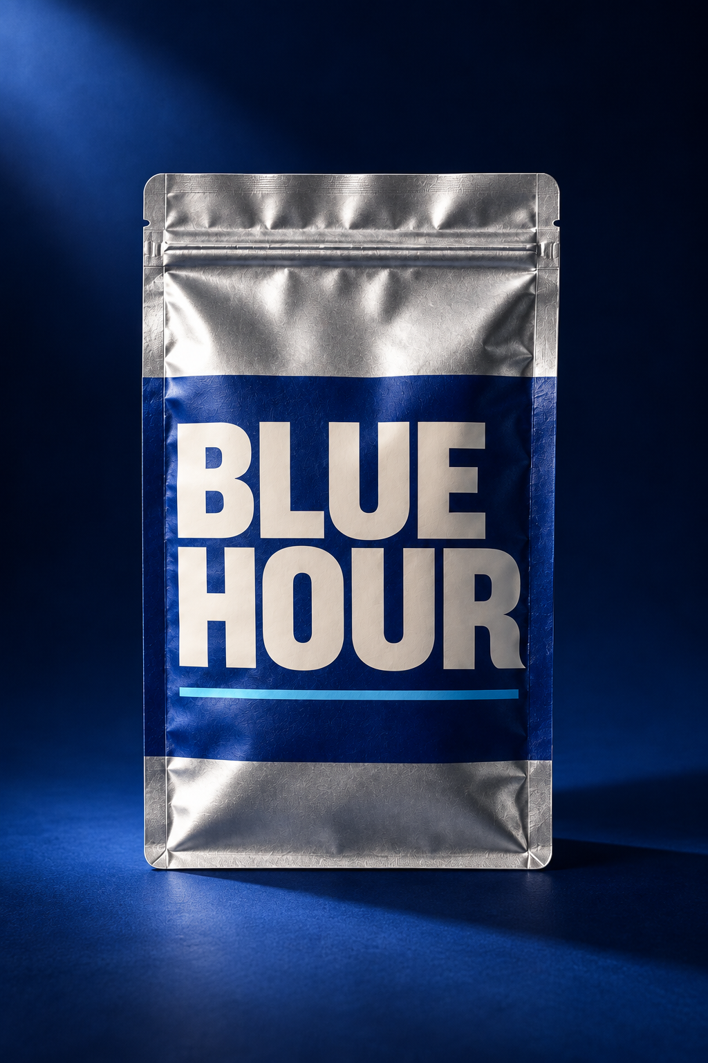 Straight front view of the Blue Hour silver pouch and cobalt identity