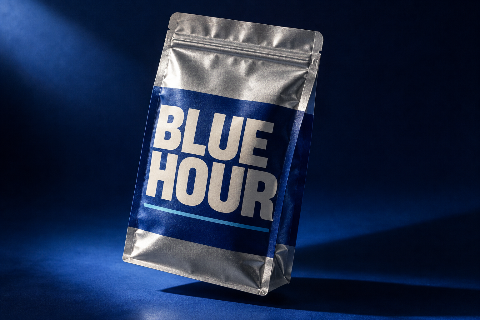 Concept: Blue Hour silver coffee pouch in deep blue light