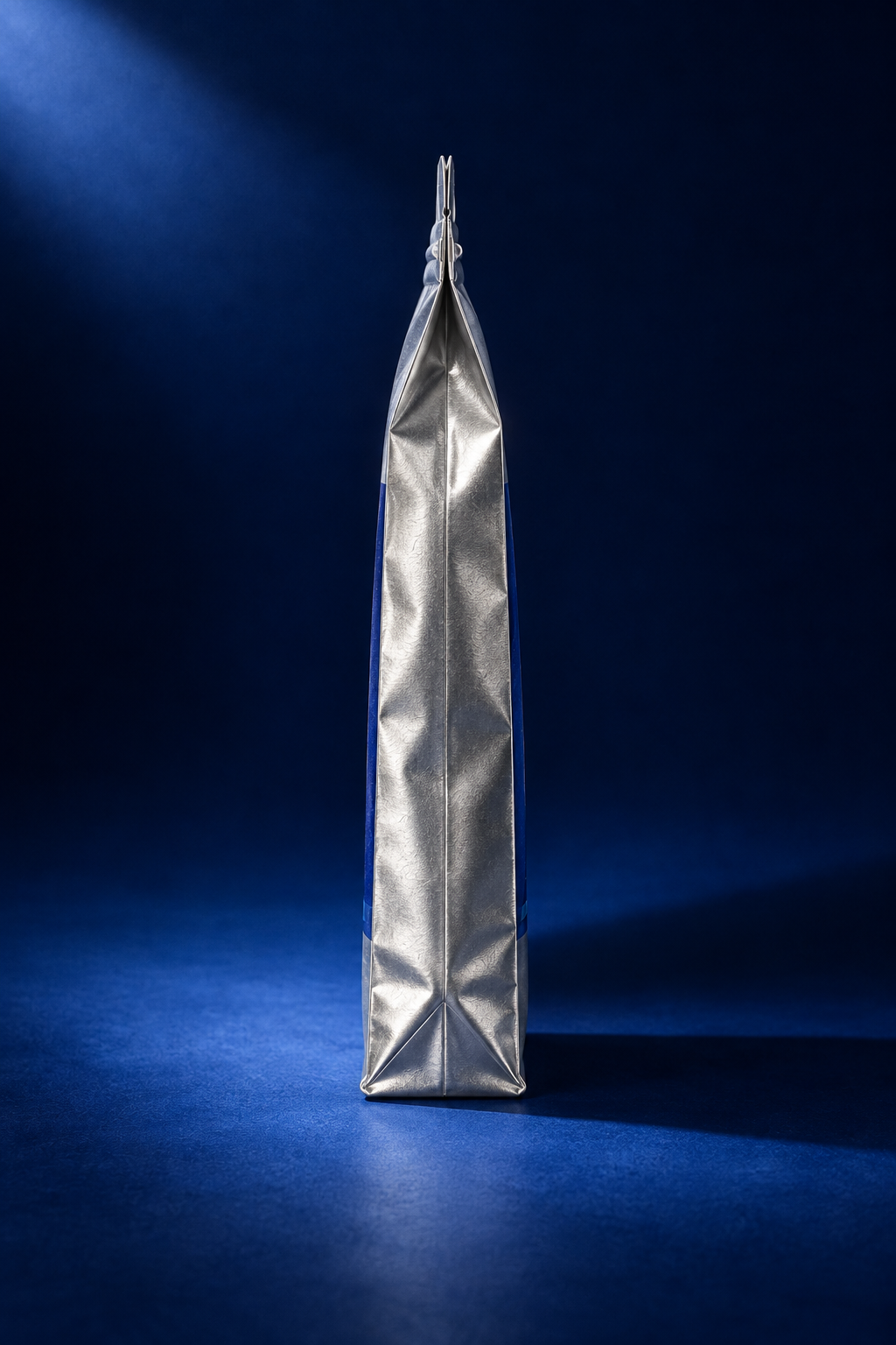 True side profile of the narrow silver gusset and folded base